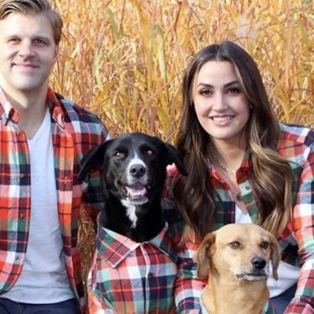 Dog Owners in matching outfits with their dogs